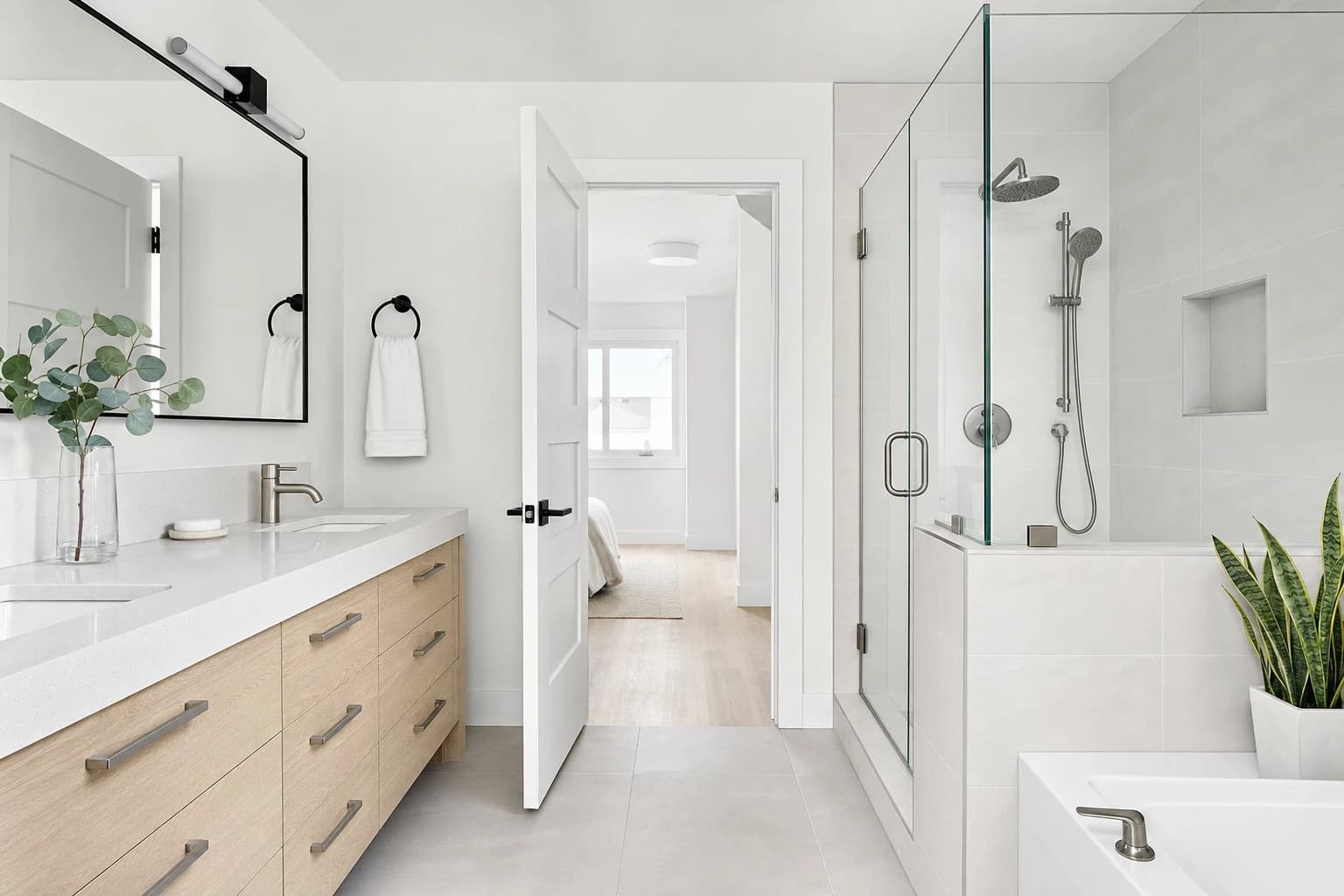 Finished room with grey porcelain tile and white-oak cabinetry from a Sacramento home remodel